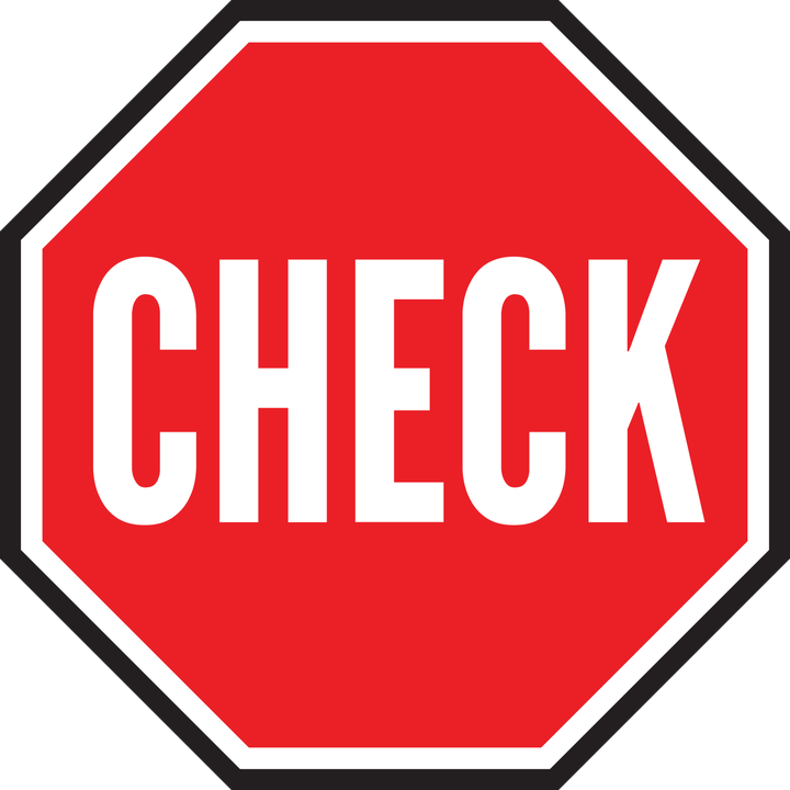 Red octagonal CHECK sign with a white border